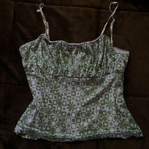 Cute green print flower top with adjustable straps and great quality fabric